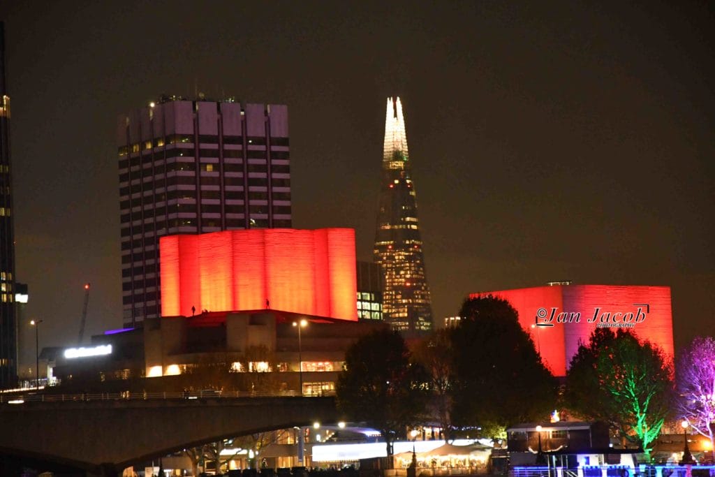 London Tourist Trips Questions 2026 Never published photography of The National Theatre London near Waterloo Bridge with the Shard on the background, The National Theatre officially opened by the Queen in 1976 and offer three independent theatre several cafe-bars, restaurant, bookshop free live acts and free exhibitions.